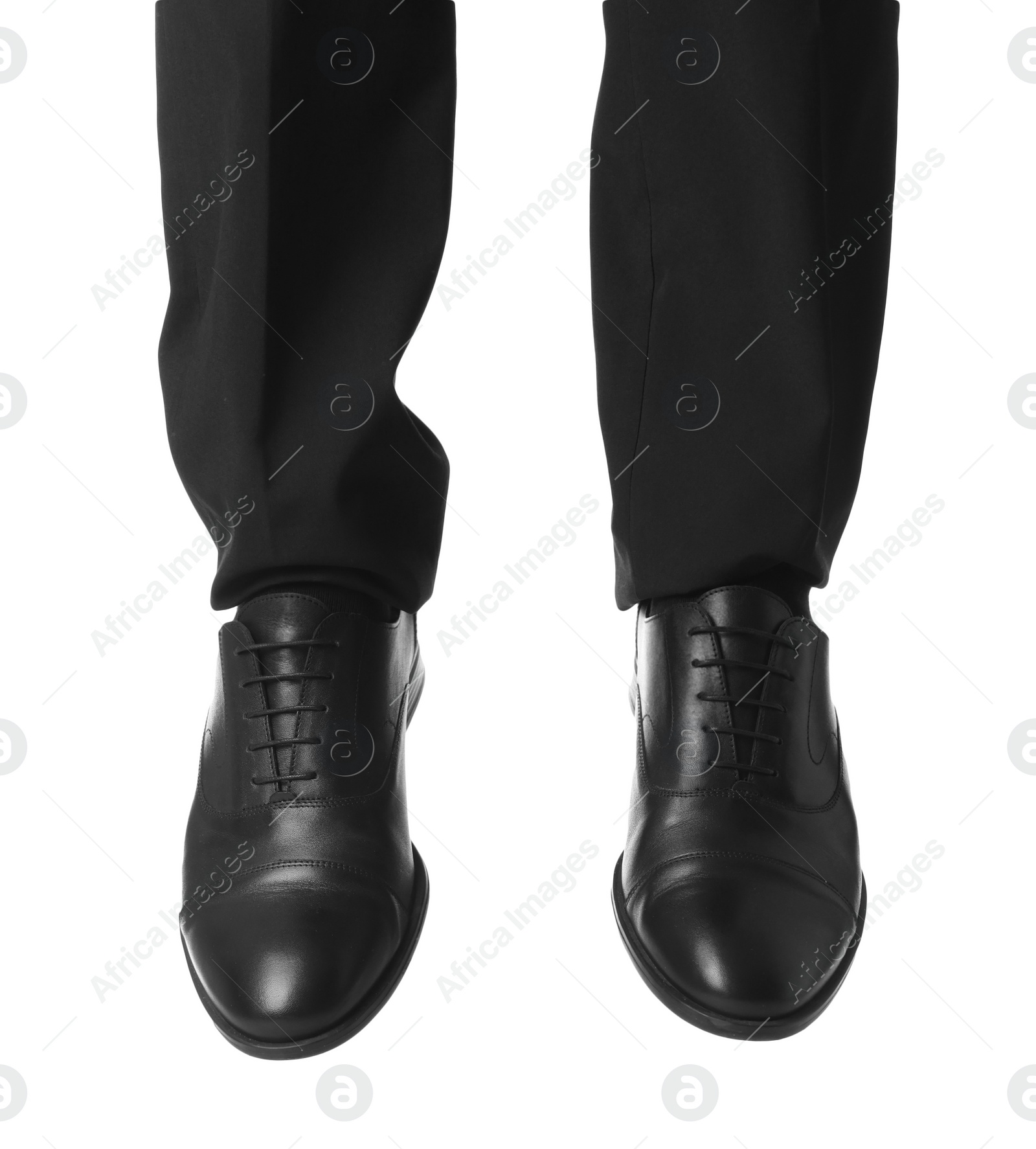 Photo of Businessman in leather shoes on white background, closeup