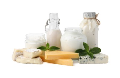 Photo of Different dairy products and mint isolated on white