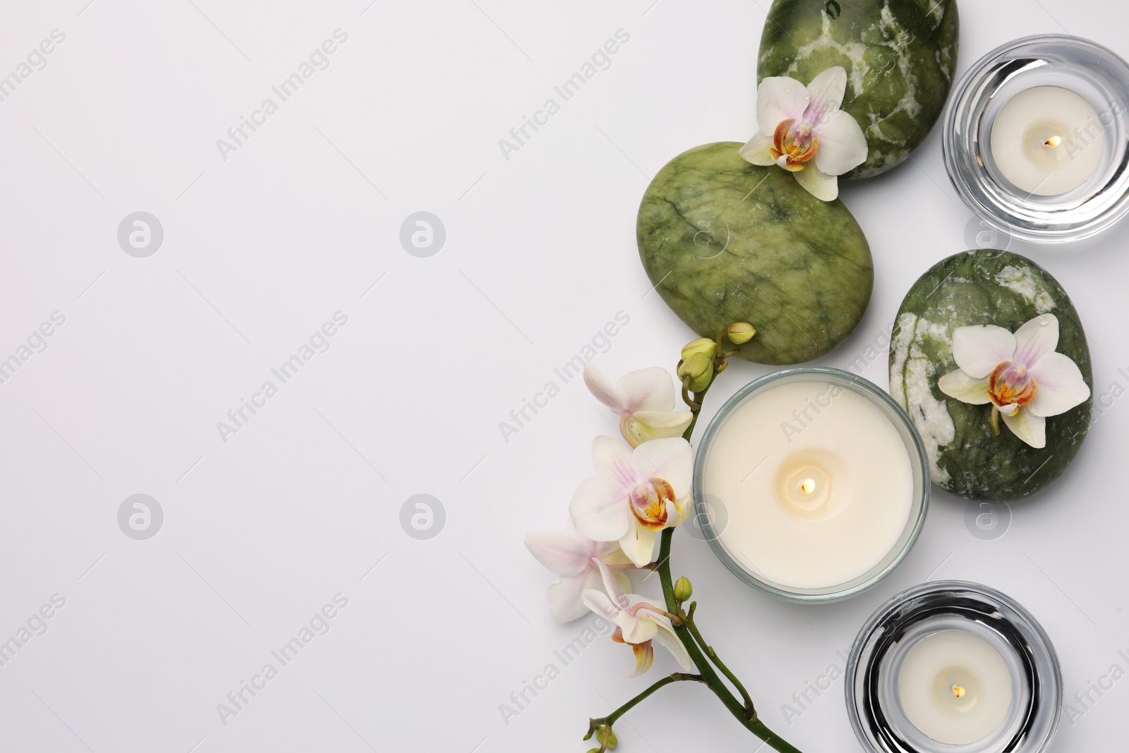 Photo of Flat lay composition with different spa products on white background. Space for text