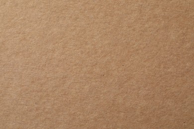 Texture of kraft paper sheet as background, closeup