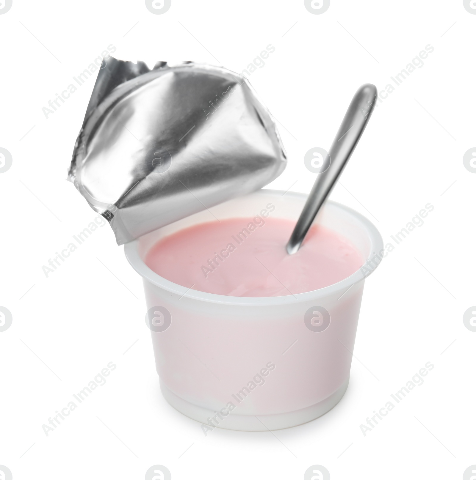 Photo of Plastic cup with creamy yogurt and spoon on white background