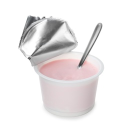 Plastic cup with creamy yogurt and spoon on white background