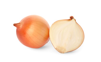 Whole and cut onions on white background