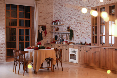 Beautiful kitchen interior with served dining table