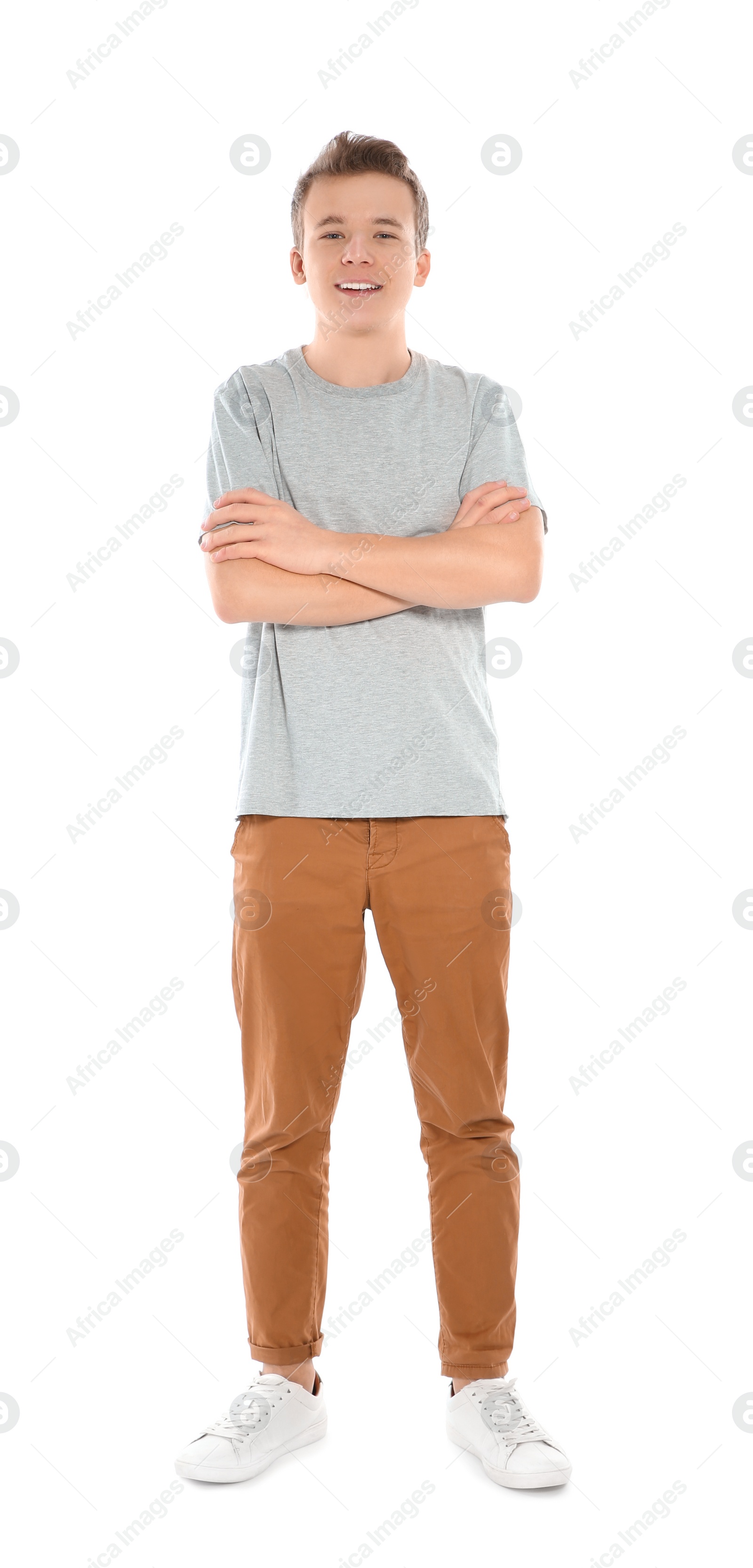 Photo of Teenager boy in casual clothes on white background