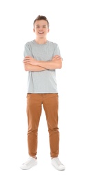 Photo of Teenager boy in casual clothes on white background