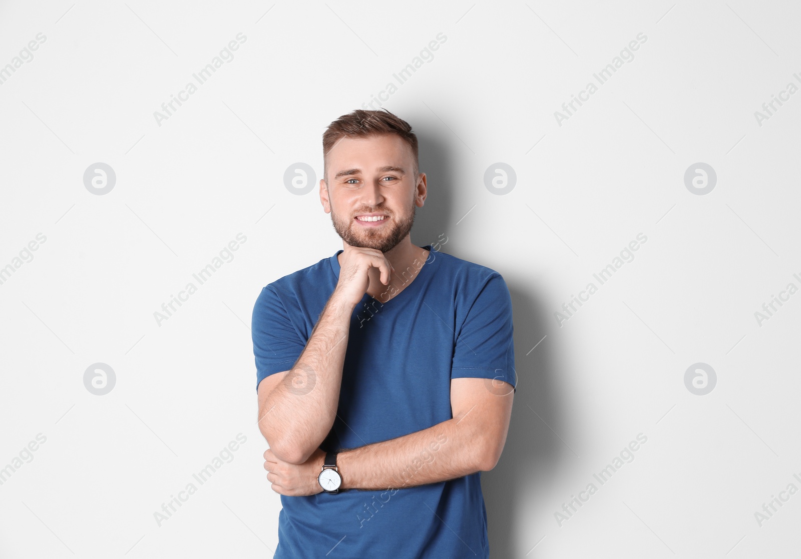 Photo of Portrait of handsome happy man on white background