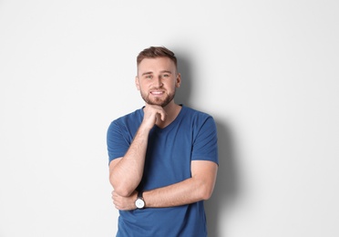 Portrait of handsome happy man on white background