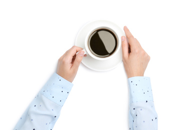Woman holding cup of coffee on white background, top view