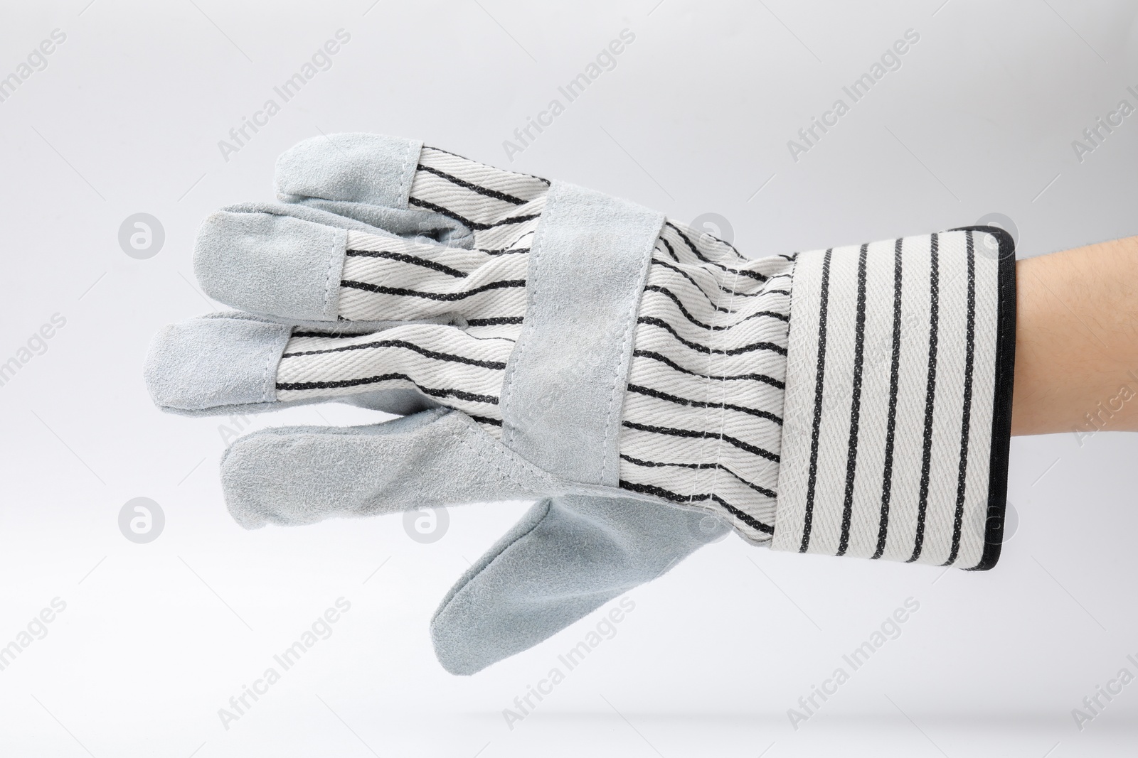 Photo of Woman in gardening glove on white background, closeup