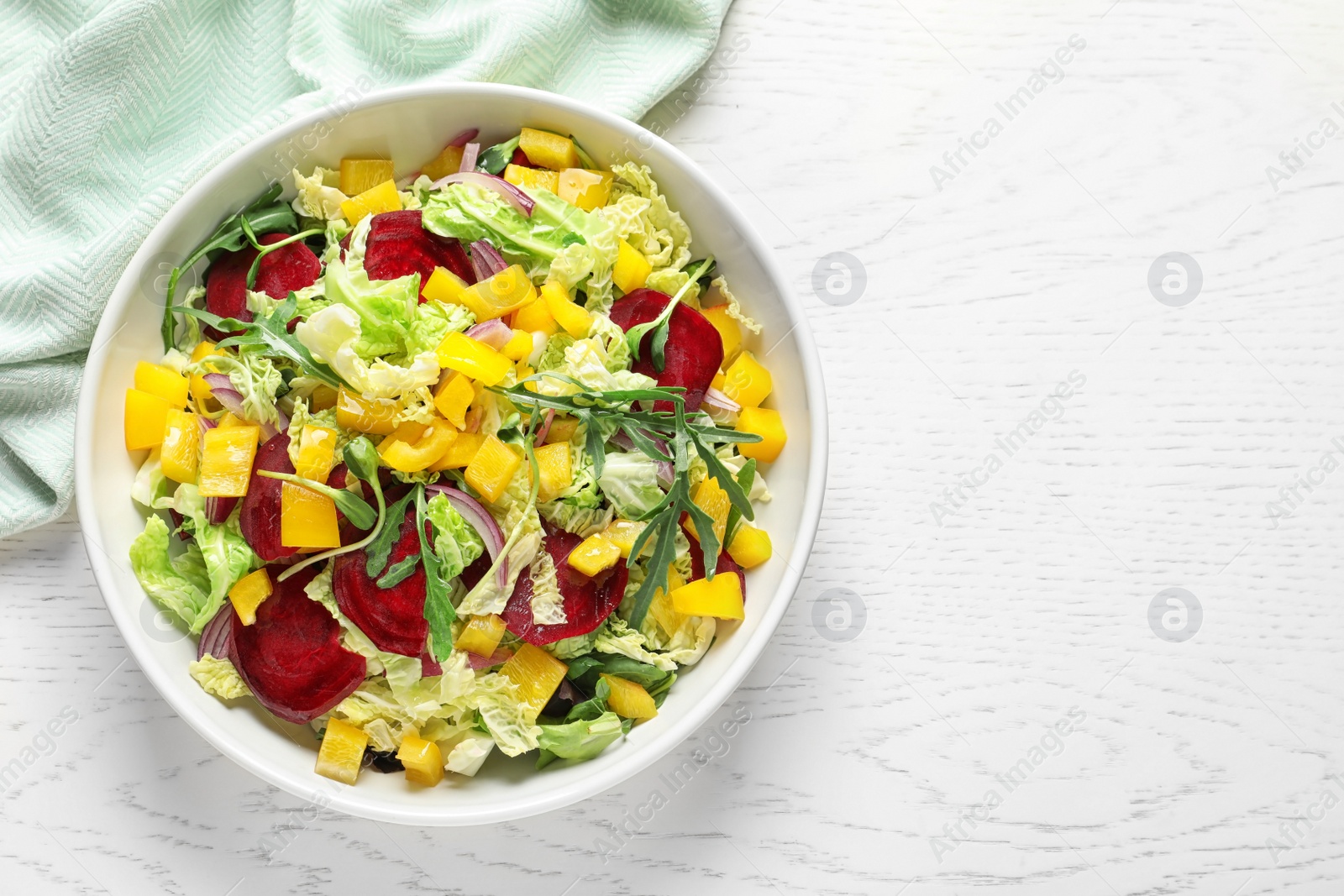 Photo of Tasty beets salad on table, top view