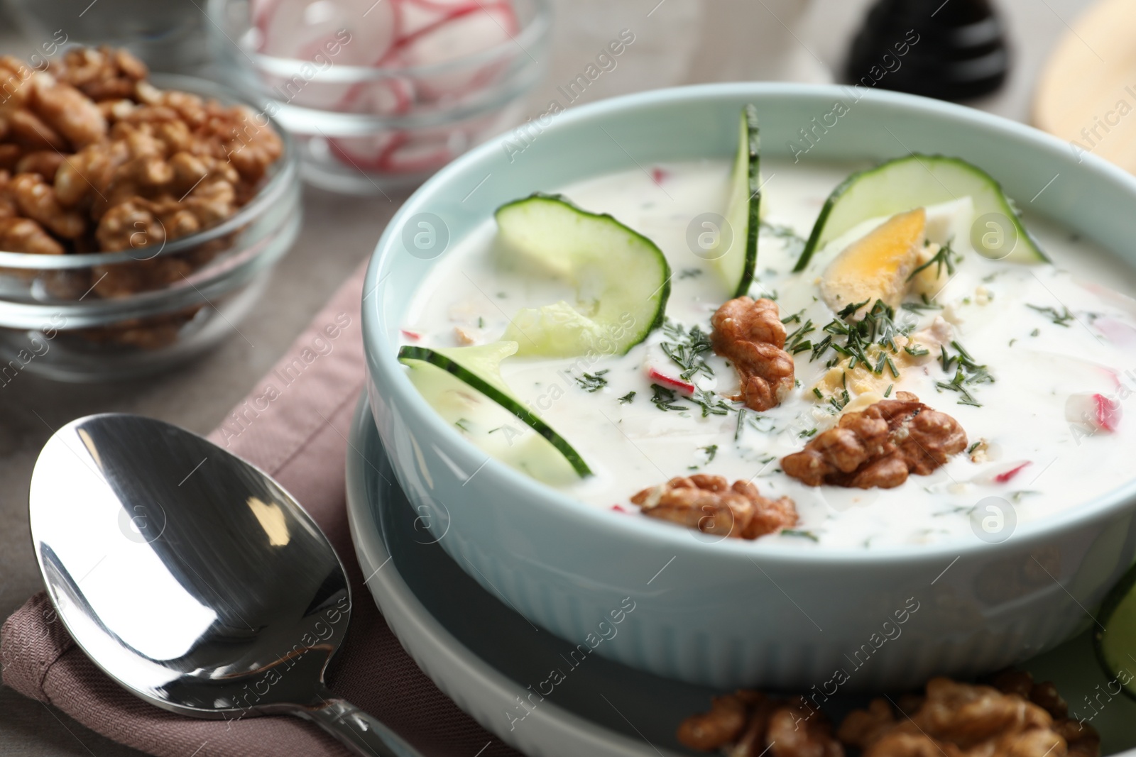 Photo of Delicious cold summer soup on table, closeup