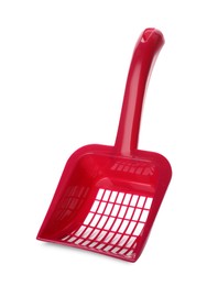 Photo of Red plastic scoop for cat litter isolated on white