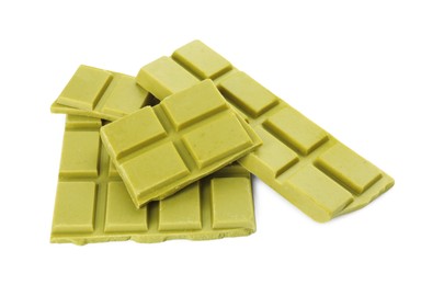 Photo of Pieces of tasty matcha chocolate bar isolated on white