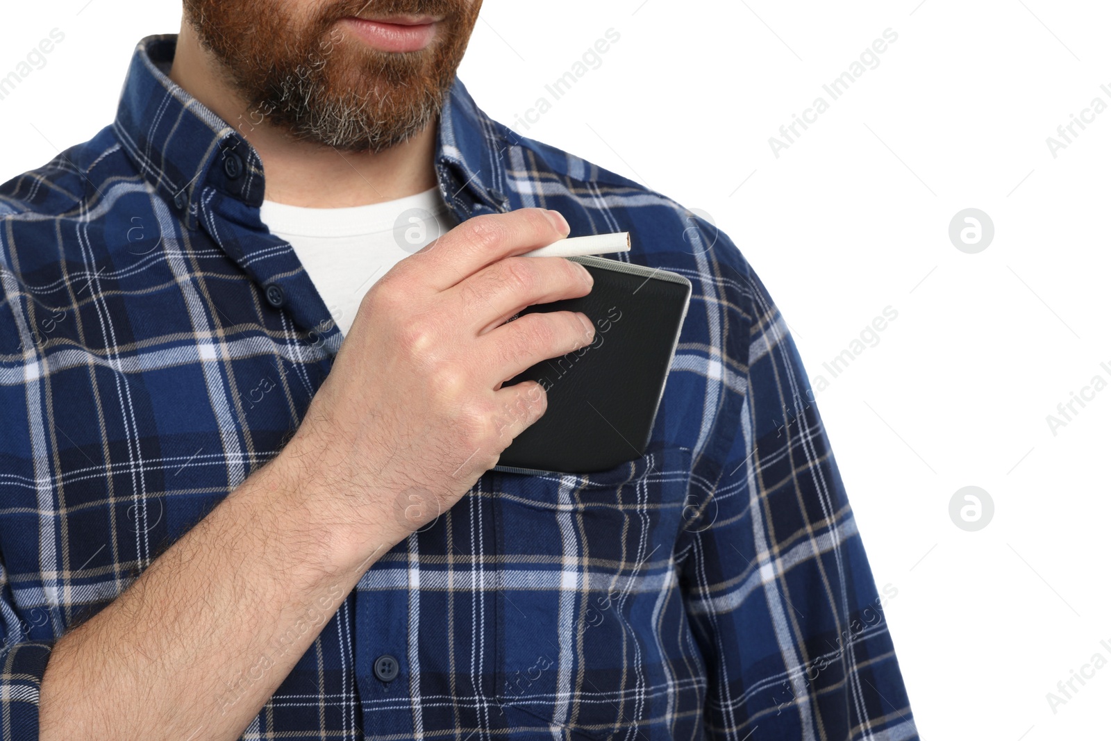 Photo of Man putting cigarette case into pocket isolated on white, closeup