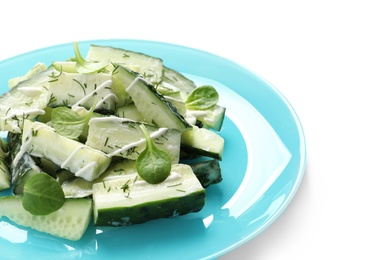 Photo of Plate with delicious cucumber salad on white background, closeup