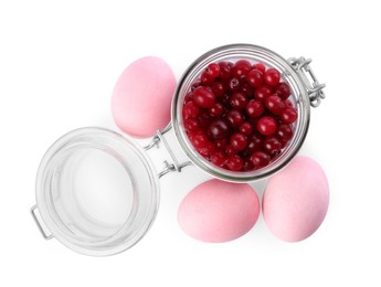 Naturally painted Easter eggs on white background, top view. Cranberries used for coloring