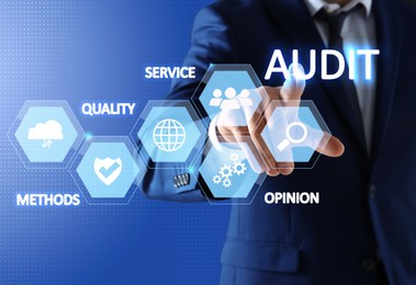 Audit concept. Closeup view of man and different icons on virtual screen