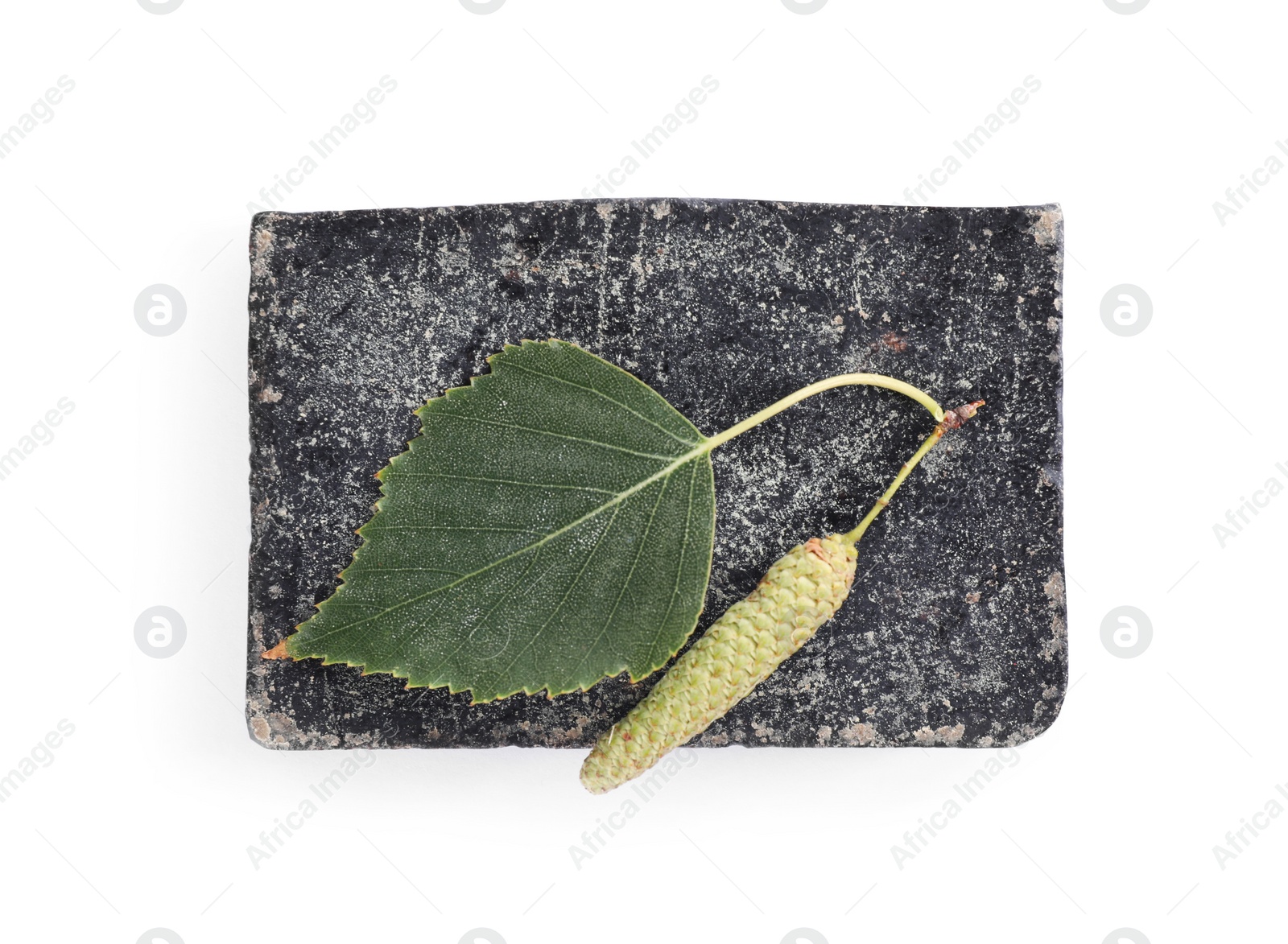 Photo of Tar soap bar isolated on white, top view. Natural product