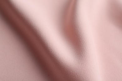 Photo of Texture of beautiful pink fabric as background, closeup