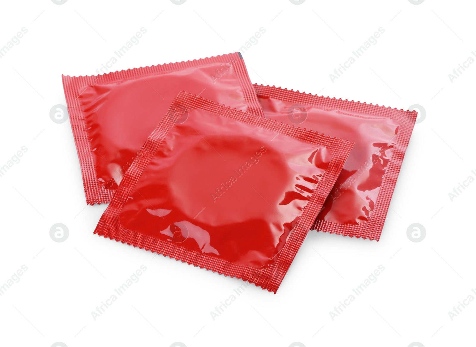 Photo of Condom packages isolated on white. Safe sex