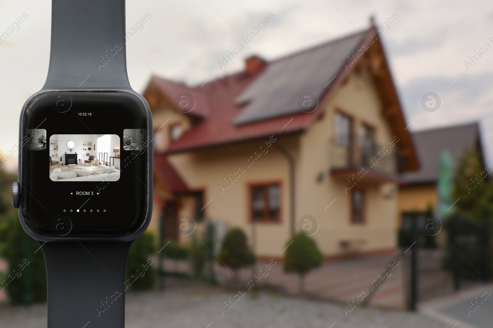 Image of Home security system. Modern smartwatch with image of room through CCTV camera on display against house, collage design