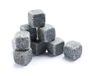 Photo of Classic grey whiskey stones on white background