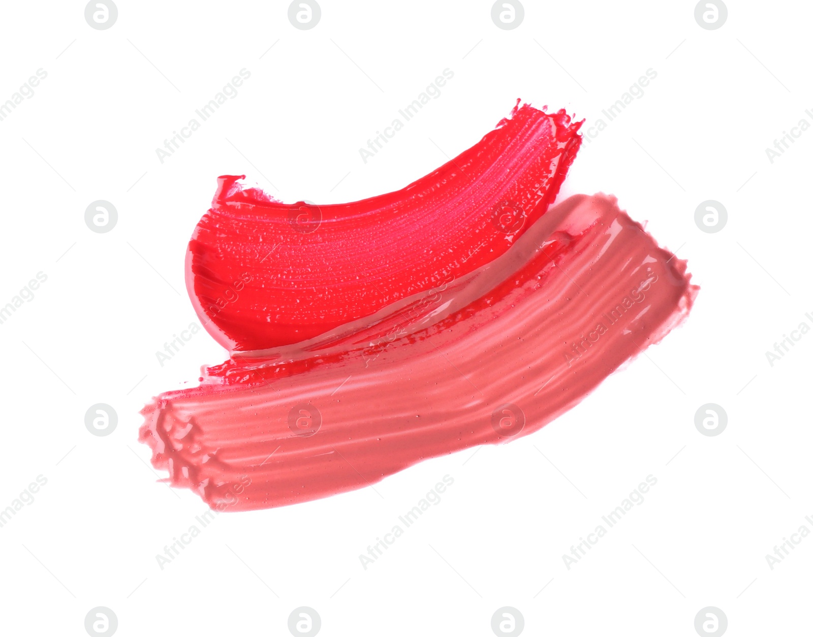 Photo of Strokes of color lip glosses isolated on white, top view