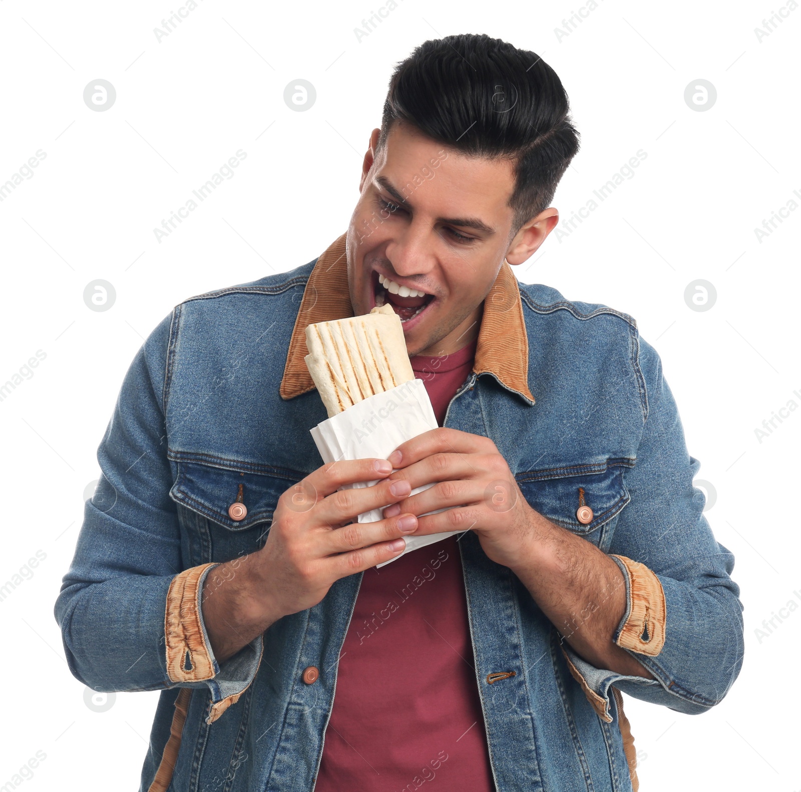 Photo of Man eating delicious shawarma on white background