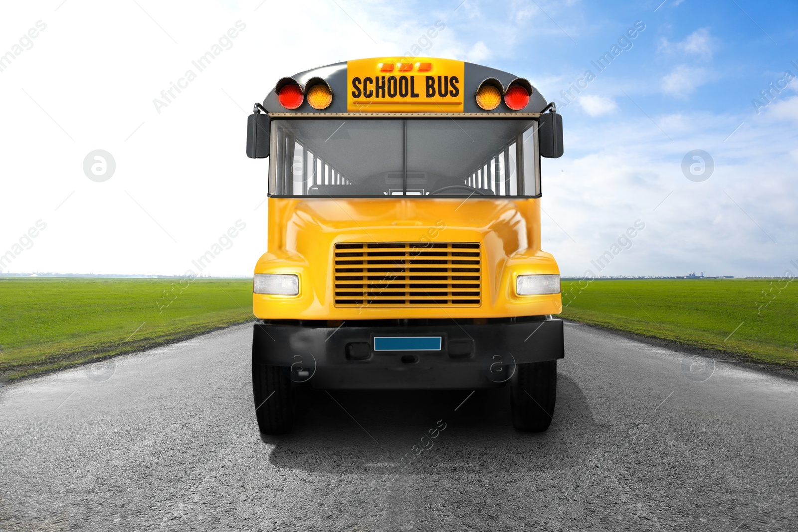 Image of Yellow school bus on road outdoors. Transport for students