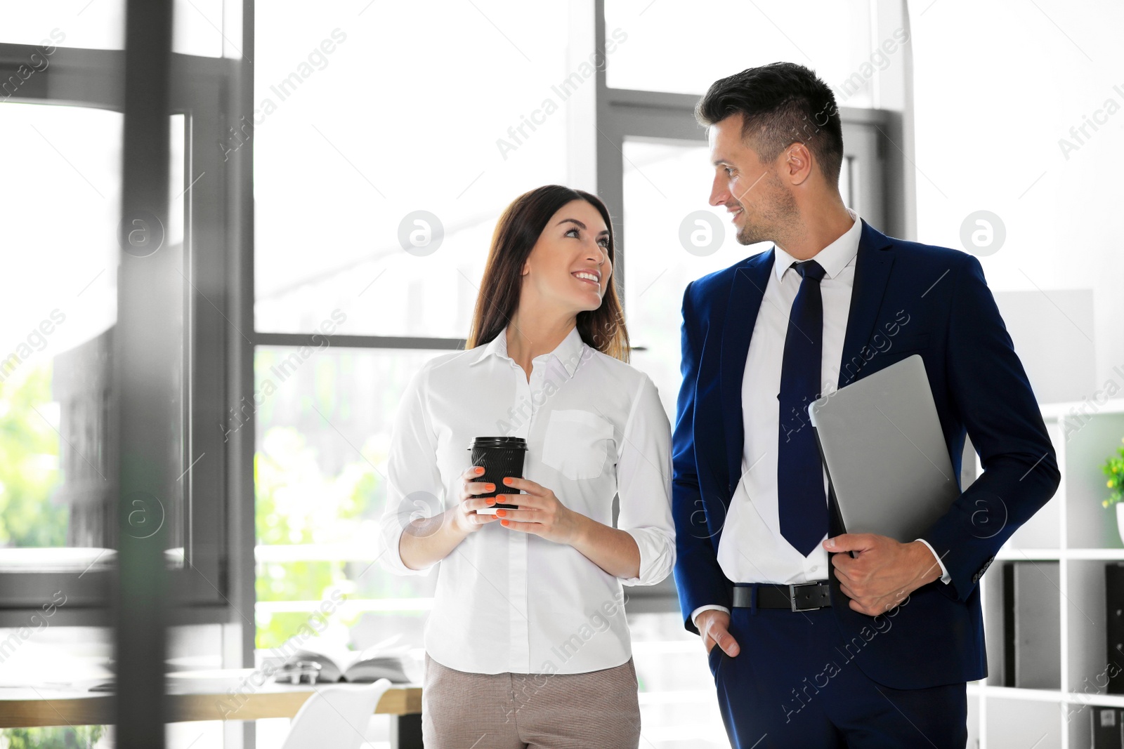 Photo of Portrait of business trainers in office wear at workplace