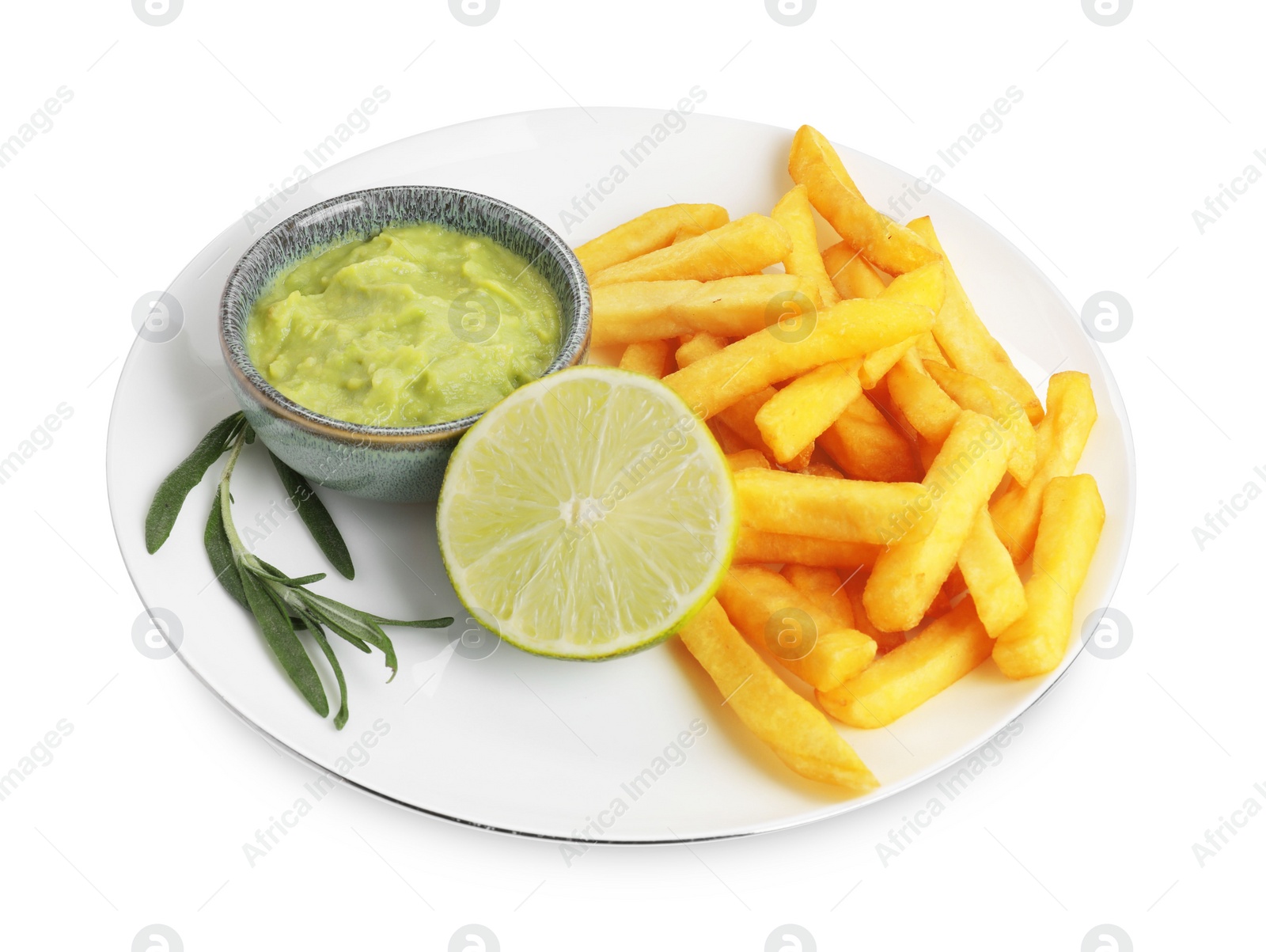 Photo of Plate with delicious french fries, avocado dip, lime and rosemary isolated on white