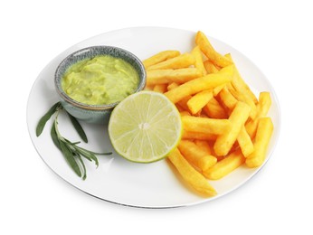 Photo of Plate with delicious french fries, avocado dip, lime and rosemary isolated on white