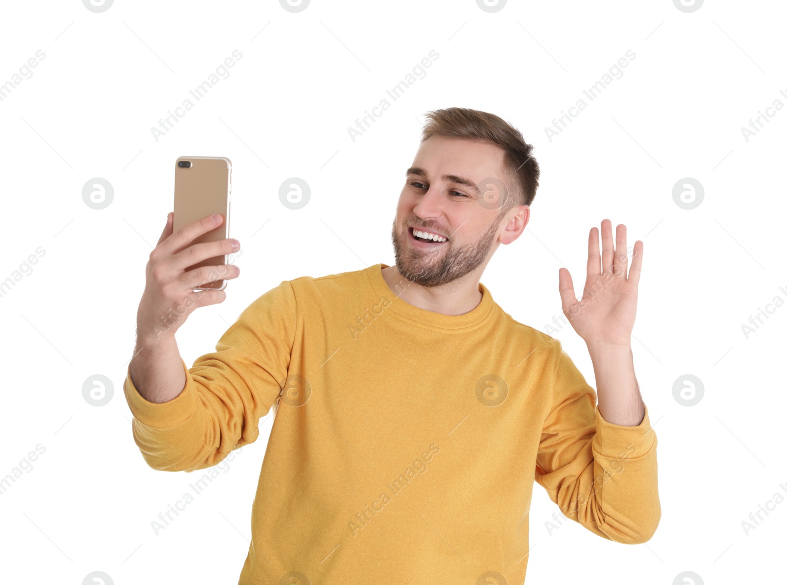 Photo of Young man using video chat on smartphone against white background