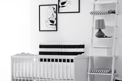 Baby bedroom interior with crib and beautiful decor elements