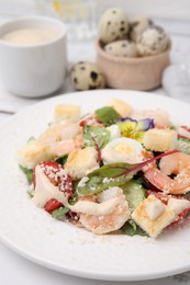 Delicious Caesar salad with shrimps on white table, closeup