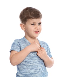 Little boy scratching chest on white background. Annoying itch