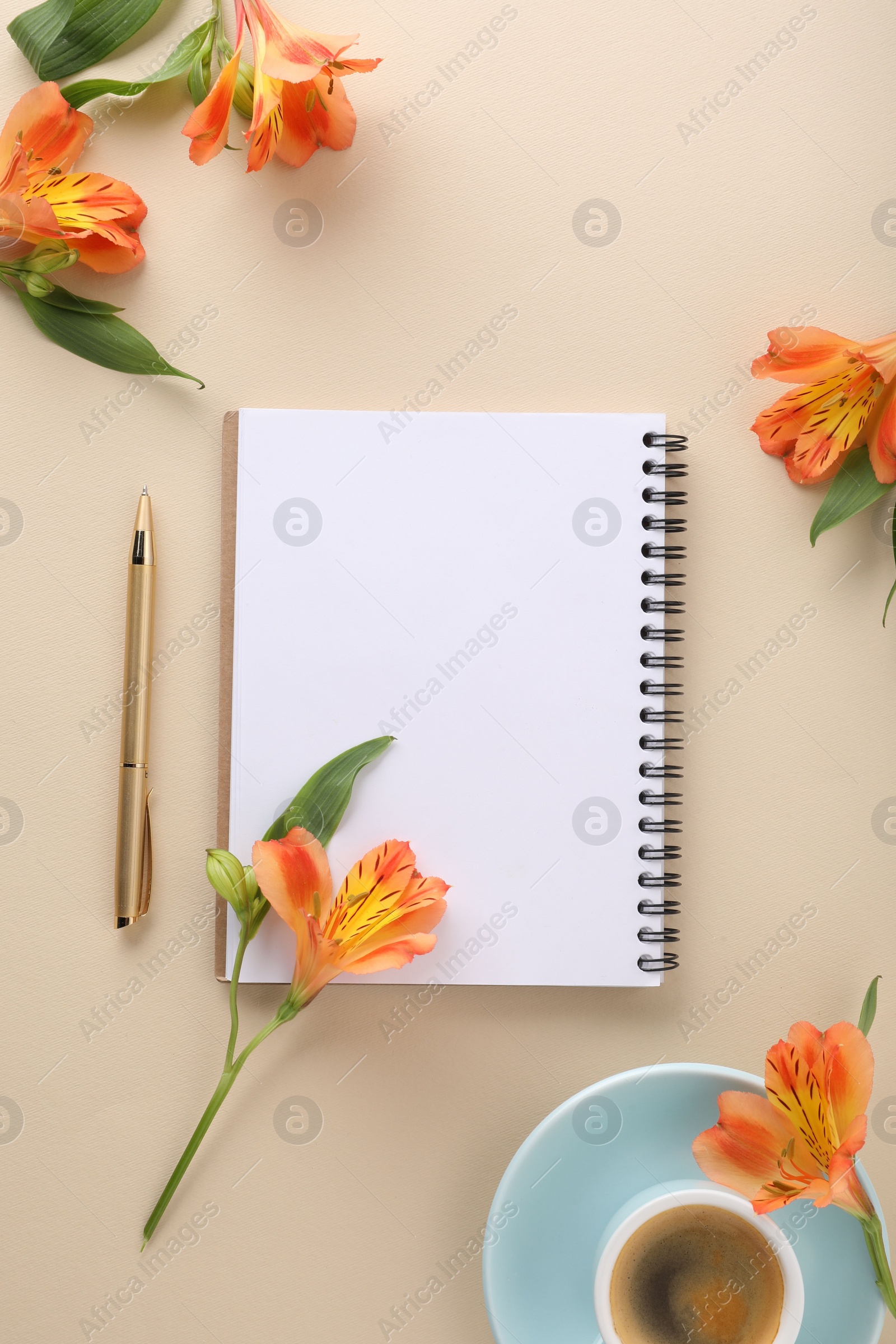 Photo of Guest list. Notebook, pen, coffee and beautiful flowers on beige table, flat lay. Space for text