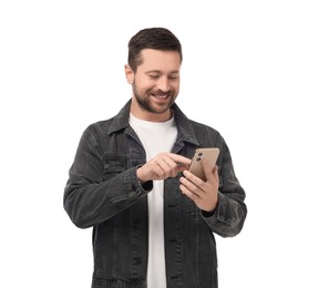 Happy man sending message via smartphone on white background