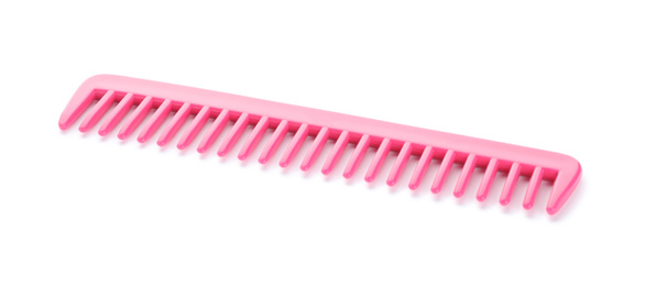 Photo of New pink hair comb isolated on white