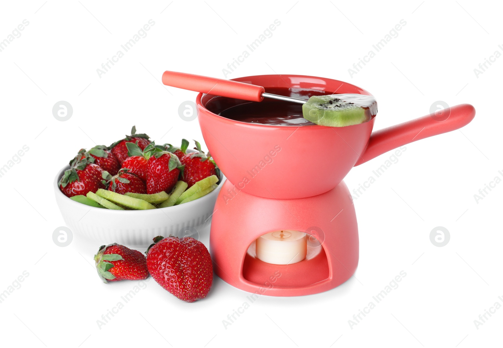 Photo of Fondue pot with chocolate, berries and fruits isolated on white