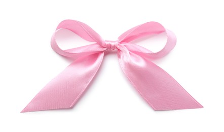 Photo of Pink satin ribbon bow on white background, top view