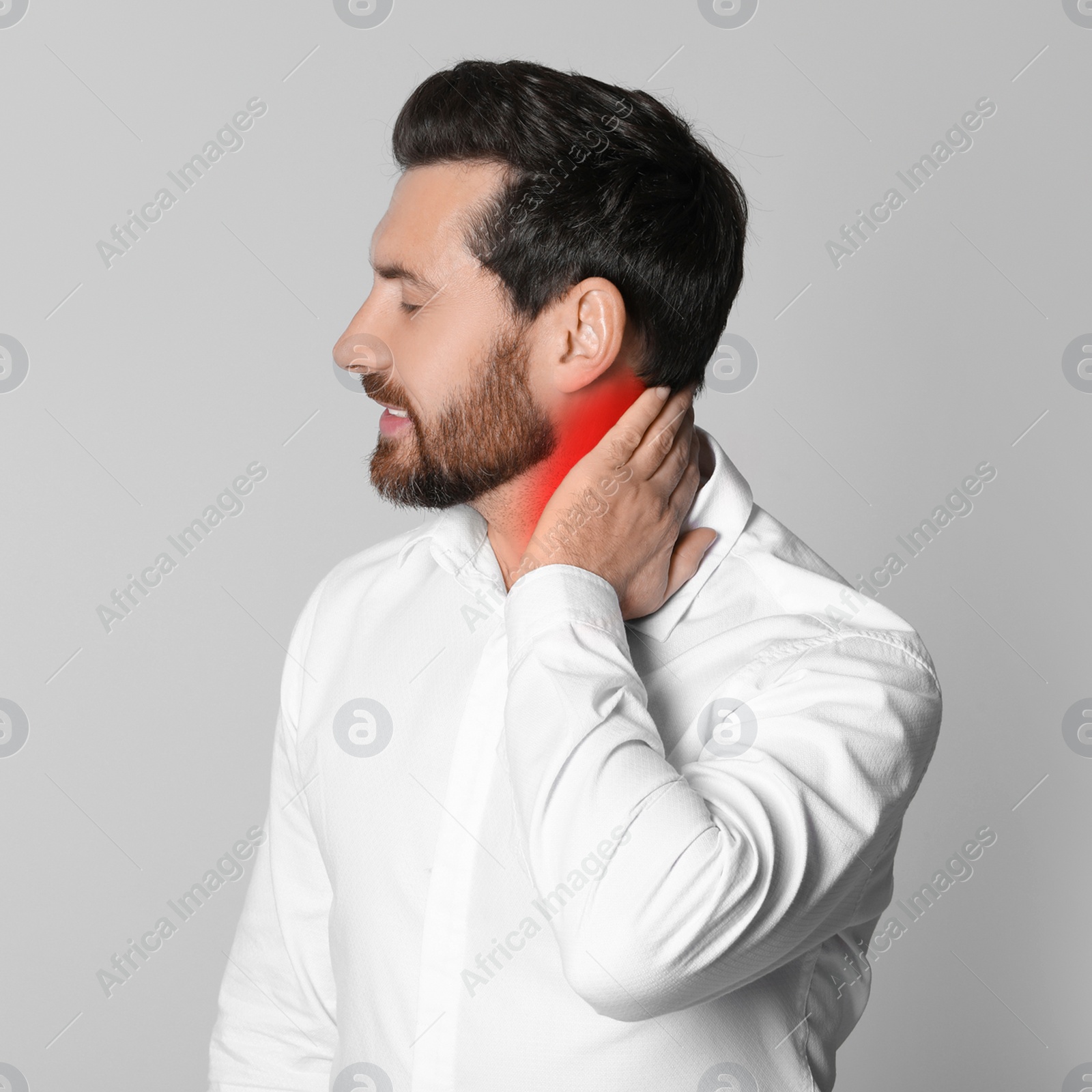 Image of Man suffering from rheumatism on light background