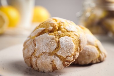 Photo of Fresh delicious lemon cookies on plate, closeup