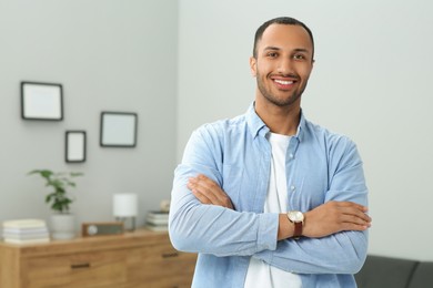 Photo of Portrait of handsome young man at home