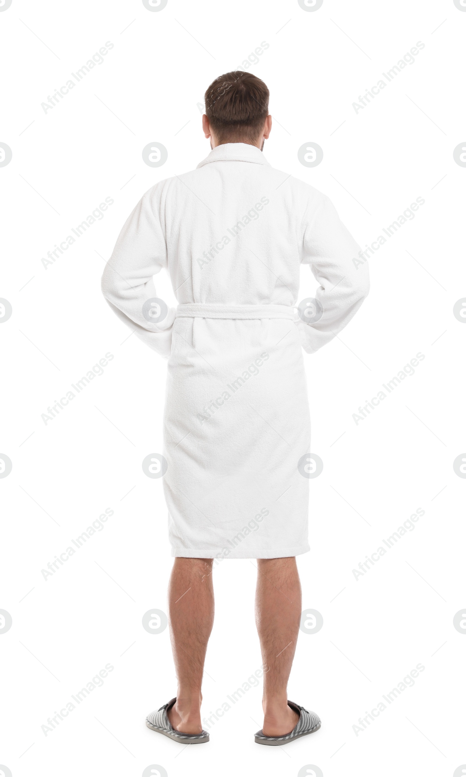 Photo of Man wearing bathrobe on white background, back view