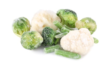 Mix of different frozen vegetables isolated on white