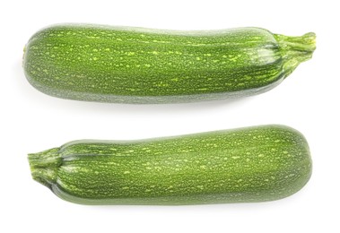 Image of Fresh ripe zucchinis on white background, top view