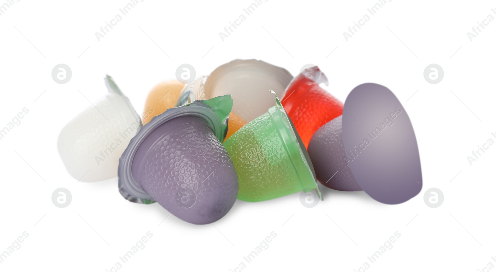 Photo of Tasty bright jelly cups on white background