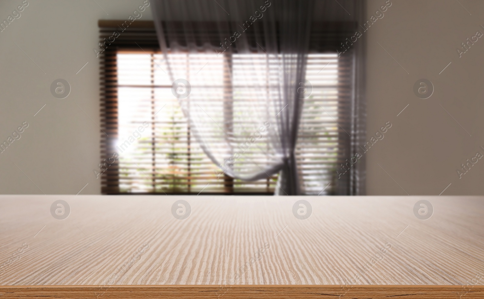 Image of Empty wooden table in room. Space for design